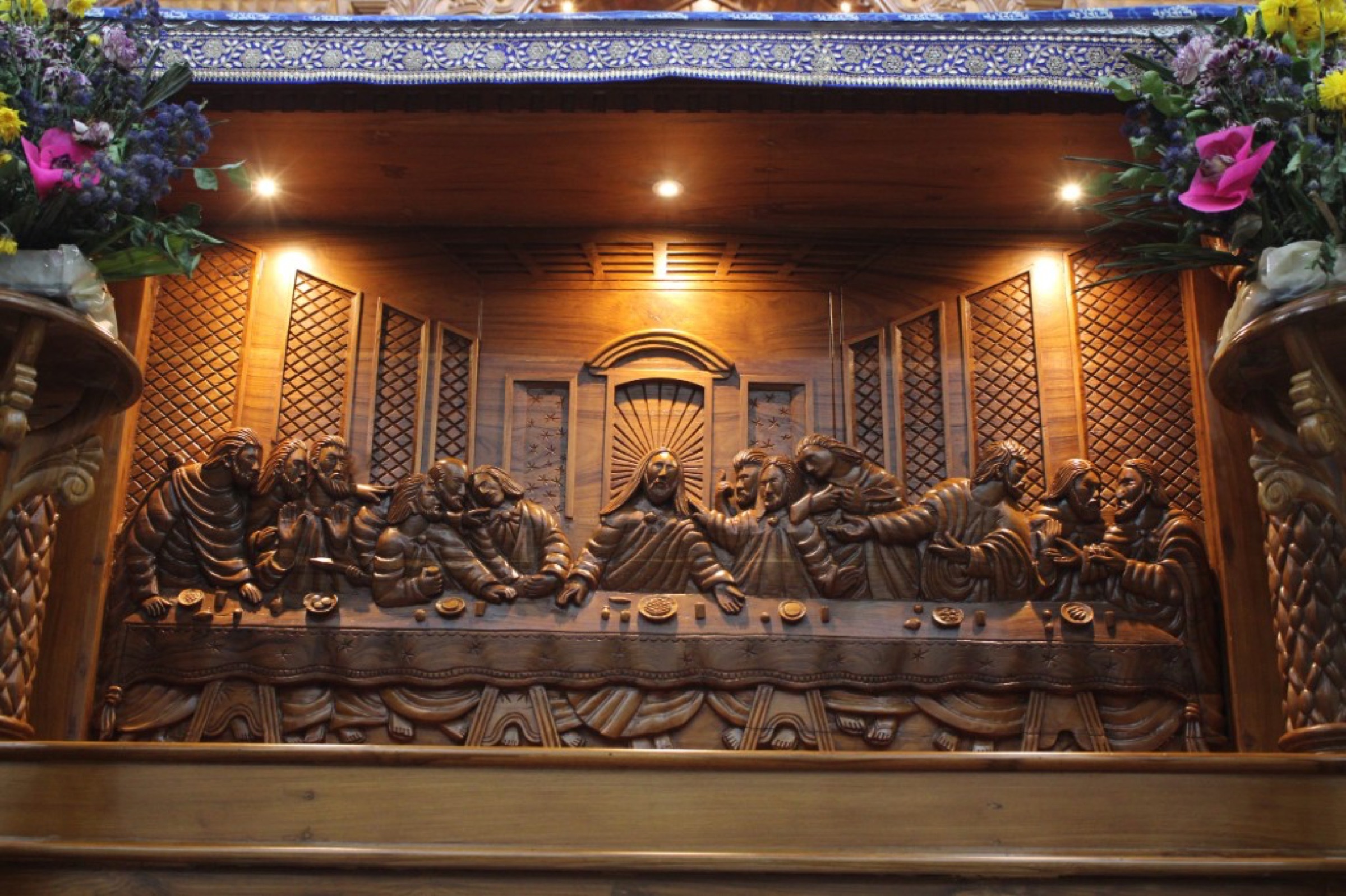 Wooden carving of the Last Supper in the church sanctuary.
